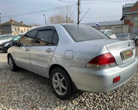 Серый Мицубиси Лансер, объемом двигателя 1.6 л и пробегом 227 тыс. км за 3599 $, фото 5 на Automoto.ua