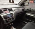Сірий Міцубісі Lancer, об'ємом двигуна 1.58 л та пробігом 209 тис. км за 2900 $, фото 17 на Automoto.ua