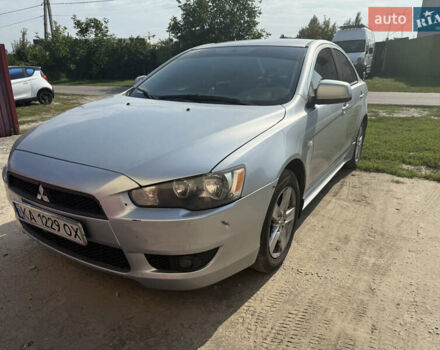 Серый Мицубиси Лансер, объемом двигателя 2 л и пробегом 439 тыс. км за 8000 $, фото 1 на Automoto.ua