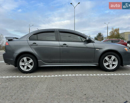 Сірий Міцубісі Lancer, об'ємом двигуна 2 л та пробігом 103 тис. км за 7500 $, фото 3 на Automoto.ua