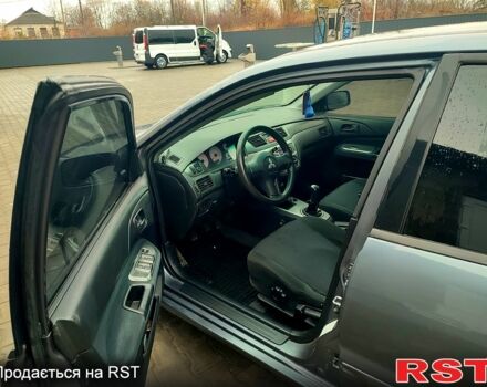 Сірий Міцубісі Lancer, об'ємом двигуна 1.6 л та пробігом 197 тис. км за 3600 $, фото 4 на Automoto.ua