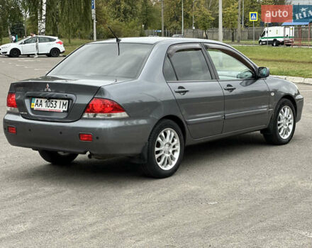Сірий Міцубісі Lancer, об'ємом двигуна 1.58 л та пробігом 94 тис. км за 6500 $, фото 2 на Automoto.ua