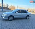 Серый Мицубиси Лансер, объемом двигателя 1.6 л и пробегом 228 тыс. км за 2999 $, фото 21 на Automoto.ua