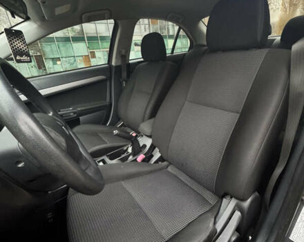 Серый Мицубиси Лансер, объемом двигателя 1.5 л и пробегом 116 тыс. км за 6000 $, фото 10 на Automoto.ua