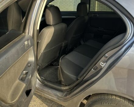 Сірий Міцубісі Lancer, об'ємом двигуна 1.5 л та пробігом 236 тис. км за 6000 $, фото 7 на Automoto.ua