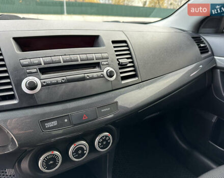 Сірий Міцубісі Lancer, об'ємом двигуна 2 л та пробігом 103 тис. км за 7500 $, фото 22 на Automoto.ua