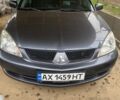 Сірий Міцубісі Lancer, об'ємом двигуна 1.6 л та пробігом 230 тис. км за 3800 $, фото 1 на Automoto.ua