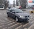 Сірий Міцубісі Lancer, об'ємом двигуна 1.58 л та пробігом 209 тис. км за 2699 $, фото 1 на Automoto.ua
