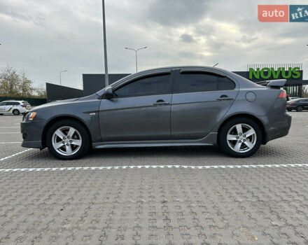 Сірий Міцубісі Lancer, об'ємом двигуна 2 л та пробігом 103 тис. км за 7500 $, фото 7 на Automoto.ua