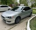 Сірий Міцубісі Lancer, об'ємом двигуна 0.15 л та пробігом 173 тис. км за 6500 $, фото 1 на Automoto.ua