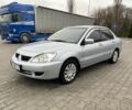 Сірий Міцубісі Lancer, об'ємом двигуна 1.6 л та пробігом 240 тис. км за 4650 $, фото 1 на Automoto.ua