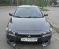 Сірий Міцубісі Lancer, об'ємом двигуна 2 л та пробігом 223 тис. км за 6900 $, фото 1 на Automoto.ua