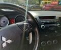 Серый Мицубиси Лансер, объемом двигателя 2 л и пробегом 296 тыс. км за 5500 $, фото 6 на Automoto.ua
