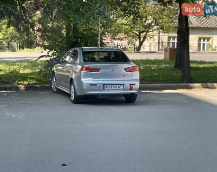 Серый Мицубиси Лансер, объемом двигателя 2 л и пробегом 143 тыс. км за 6850 $, фото 3 на Automoto.ua