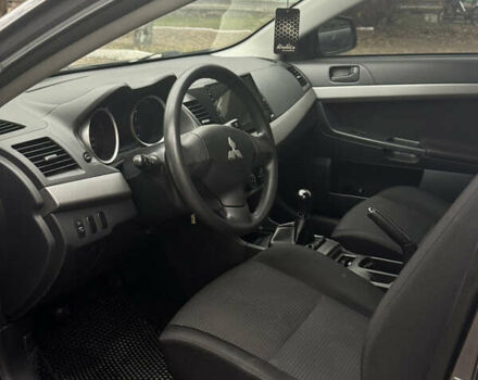 Серый Мицубиси Лансер, объемом двигателя 1.5 л и пробегом 116 тыс. км за 6000 $, фото 9 на Automoto.ua