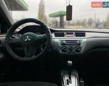 Сірий Міцубісі Lancer, об'ємом двигуна 1.58 л та пробігом 280 тис. км за 4650 $, фото 12 на Automoto.ua