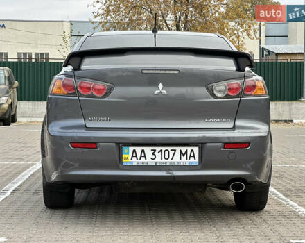 Сірий Міцубісі Lancer, об'ємом двигуна 2 л та пробігом 103 тис. км за 7500 $, фото 5 на Automoto.ua