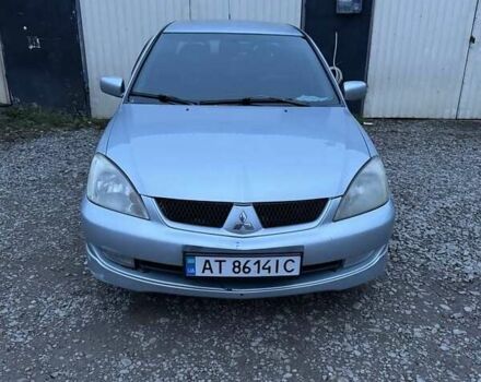 Серый Мицубиси Лансер, объемом двигателя 1.58 л и пробегом 227 тыс. км за 3200 $, фото 4 на Automoto.ua