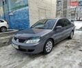 Сірий Міцубісі Lancer, об'ємом двигуна 1.58 л та пробігом 119 тис. км за 6700 $, фото 1 на Automoto.ua