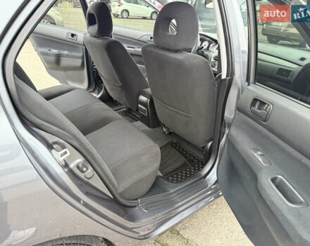 Сірий Міцубісі Lancer, об'ємом двигуна 0 л та пробігом 62 тис. км за 7250 $, фото 17 на Automoto.ua