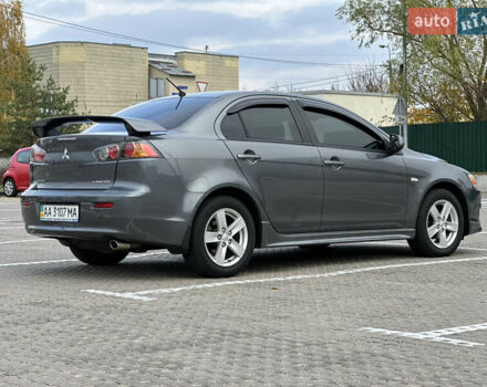 Сірий Міцубісі Lancer, об'ємом двигуна 2 л та пробігом 103 тис. км за 7500 $, фото 4 на Automoto.ua