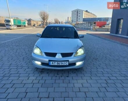 Серый Мицубиси Лансер, объемом двигателя 1.6 л и пробегом 228 тыс. км за 2999 $, фото 4 на Automoto.ua