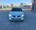 Серый Мицубиси Лансер, объемом двигателя 1.6 л и пробегом 228 тыс. км за 2999 $, фото 4 на Automoto.ua