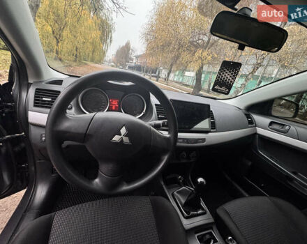 Серый Мицубиси Лансер, объемом двигателя 1.5 л и пробегом 116 тыс. км за 6000 $, фото 11 на Automoto.ua