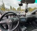 Серый Мицубиси Лансер, объемом двигателя 1.6 л и пробегом 218 тыс. км за 5100 $, фото 6 на Automoto.ua