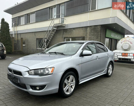 Серый Мицубиси Лансер, объемом двигателя 2 л и пробегом 279 тыс. км за 4999 $, фото 2 на Automoto.ua