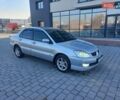 Серый Мицубиси Лансер, объемом двигателя 1.6 л и пробегом 228 тыс. км за 3450 $, фото 12 на Automoto.ua