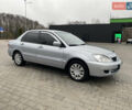 Сірий Міцубісі Lancer, об'ємом двигуна 1.58 л та пробігом 280 тис. км за 4650 $, фото 8 на Automoto.ua