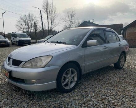 Серый Мицубиси Лансер, объемом двигателя 1.6 л и пробегом 227 тыс. км за 3599 $, фото 7 на Automoto.ua