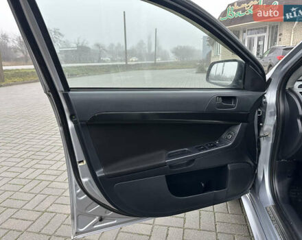 Серый Мицубиси Лансер, объемом двигателя 2 л и пробегом 279 тыс. км за 4999 $, фото 12 на Automoto.ua