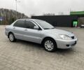 Сірий Міцубісі Lancer, об'ємом двигуна 1.6 л та пробігом 240 тис. км за 4650 $, фото 9 на Automoto.ua