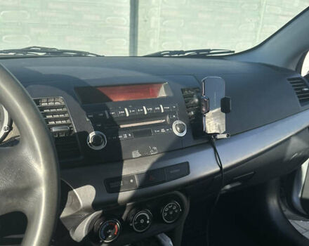 Серый Мицубиси Лансер, объемом двигателя 1.5 л и пробегом 230 тыс. км за 6300 $, фото 18 на Automoto.ua