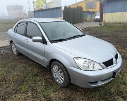 Сірий Міцубісі Lancer, об'ємом двигуна 1.6 л та пробігом 230 тис. км за 3400 $, фото 4 на Automoto.ua