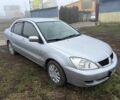 Сірий Міцубісі Lancer, об'ємом двигуна 1.6 л та пробігом 230 тис. км за 3400 $, фото 4 на Automoto.ua