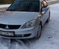 Серый Мицубиси Лансер, объемом двигателя 1.6 л и пробегом 180 тыс. км за 4750 $, фото 3 на Automoto.ua