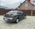 Сірий Міцубісі Lancer, об'ємом двигуна 2 л та пробігом 226 тис. км за 7600 $, фото 2 на Automoto.ua
