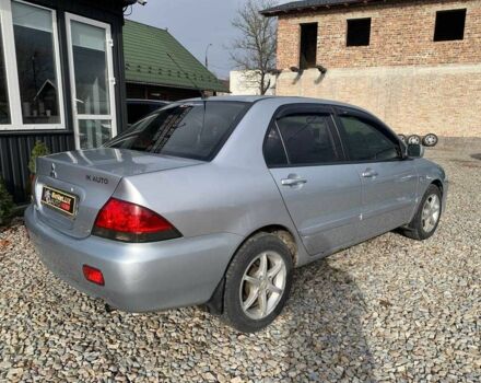 Серый Мицубиси Лансер, объемом двигателя 1.6 л и пробегом 227 тыс. км за 3599 $, фото 3 на Automoto.ua