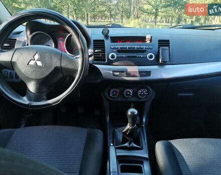 Серый Мицубиси Лансер, объемом двигателя 1.5 л и пробегом 183 тыс. км за 5900 $, фото 4 на Automoto.ua