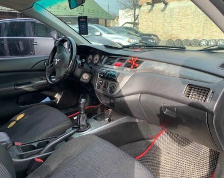 Серый Мицубиси Лансер, объемом двигателя 1.6 л и пробегом 227 тыс. км за 3599 $, фото 12 на Automoto.ua