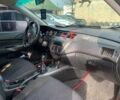 Серый Мицубиси Лансер, объемом двигателя 1.6 л и пробегом 227 тыс. км за 3599 $, фото 12 на Automoto.ua