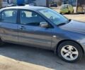 Сірий Міцубісі Lancer, об'ємом двигуна 1.6 л та пробігом 282 тис. км за 3100 $, фото 1 на Automoto.ua