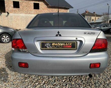 Серый Мицубиси Лансер, объемом двигателя 1.6 л и пробегом 227 тыс. км за 3599 $, фото 4 на Automoto.ua