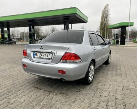 Сірий Міцубісі Lancer, об'ємом двигуна 1.6 л та пробігом 240 тис. км за 4650 $, фото 6 на Automoto.ua