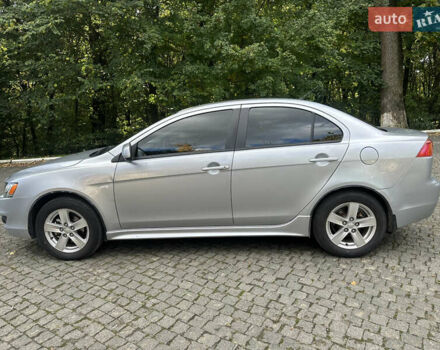 Сірий Міцубісі Lancer, об'ємом двигуна 2 л та пробігом 195 тис. км за 5200 $, фото 6 на Automoto.ua