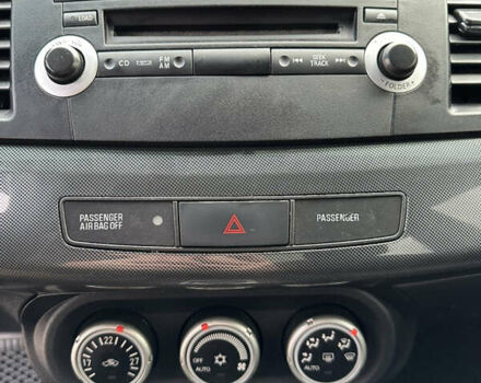 Сірий Міцубісі Lancer, об'ємом двигуна 2 л та пробігом 103 тис. км за 7500 $, фото 21 на Automoto.ua