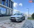 Серый Мицубиси Лансер, объемом двигателя 1.5 л и пробегом 224 тыс. км за 5900 $, фото 1 на Automoto.ua